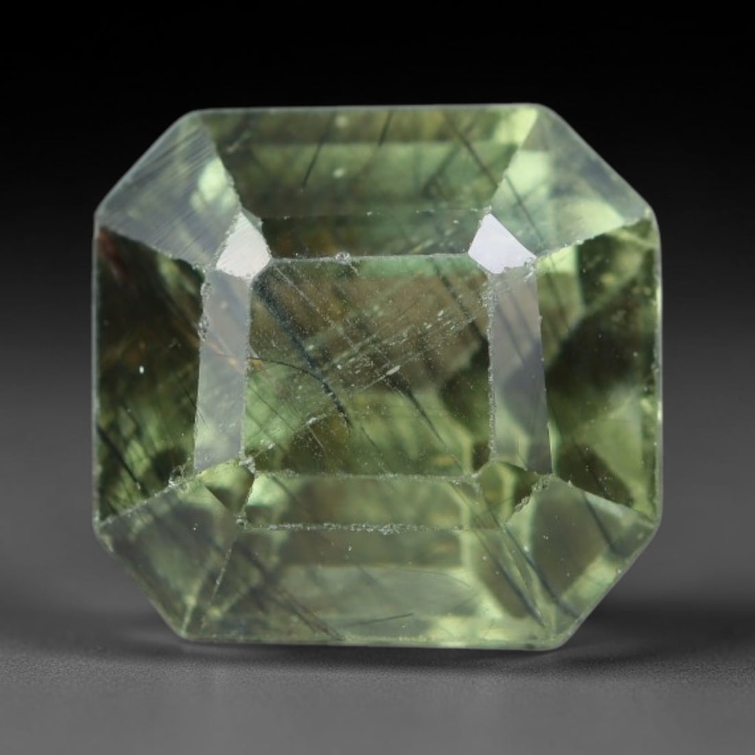 3.40 Carats Natural Green Rutilated Peridot Faceted Loose Gemstone, 71XY: This peridot is sourced from natural mineral deposits and crafted with meticulous faceting and glossy surface polishing through professional lapidary processing. Fine needle-shaped rutile filaments di