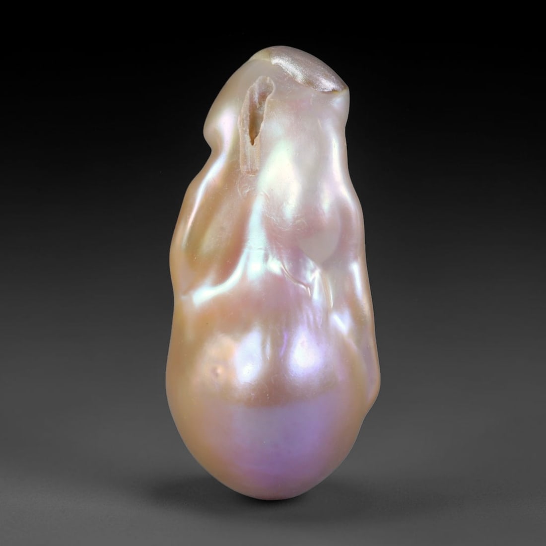 Natural Freshwater Keshi Pearl Baroque Loose Pearl, 89WE: This natural freshwater keshi pearl presents an organic irregular baroque silhouette with rich shifting iridescent nacre displaying soft champagne, peach and lavender overtones across its surface. Sub