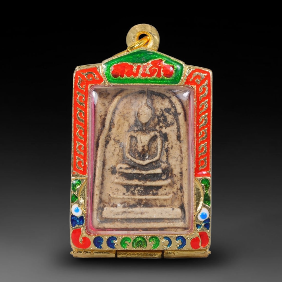 Thai Gilded Clay Metal Amulet Buddhist Votive Pendant, 71ZB: Constructed from fired clay with light gilded finishing layers, the piece uses traditional molded crafting techniques typical of Southeast Asian devotional artifacts. Its rectangular form follows stan