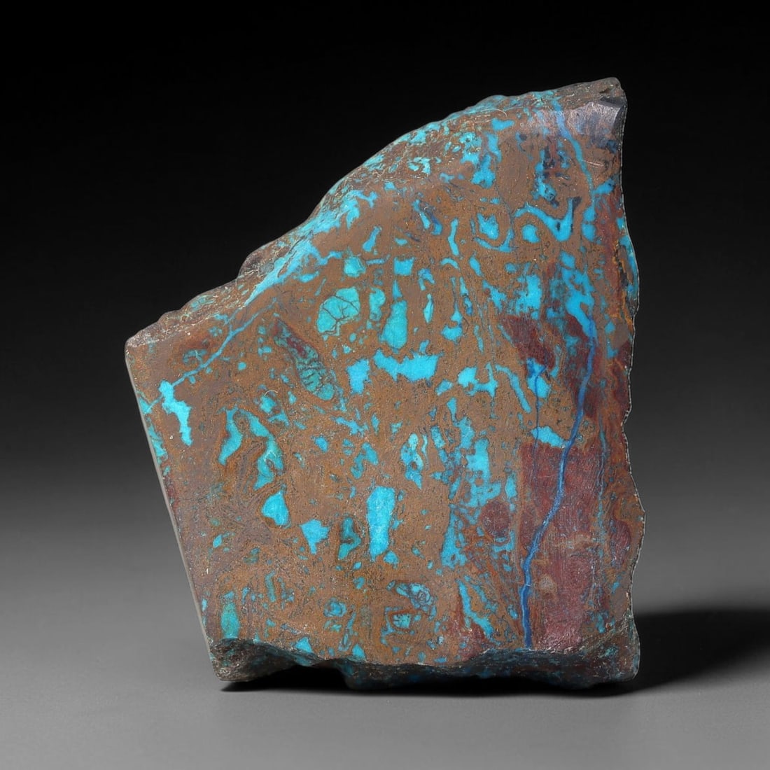 88ct Natural Peruvian Chrysocolla Polished Slab Rough, 67WV: This partial-polished chrysocolla slab features blended mineral matrix with smooth refined face and unaltered natural rugged edge across its 33x29x7mm elongated form, translucent mineral layers hold s