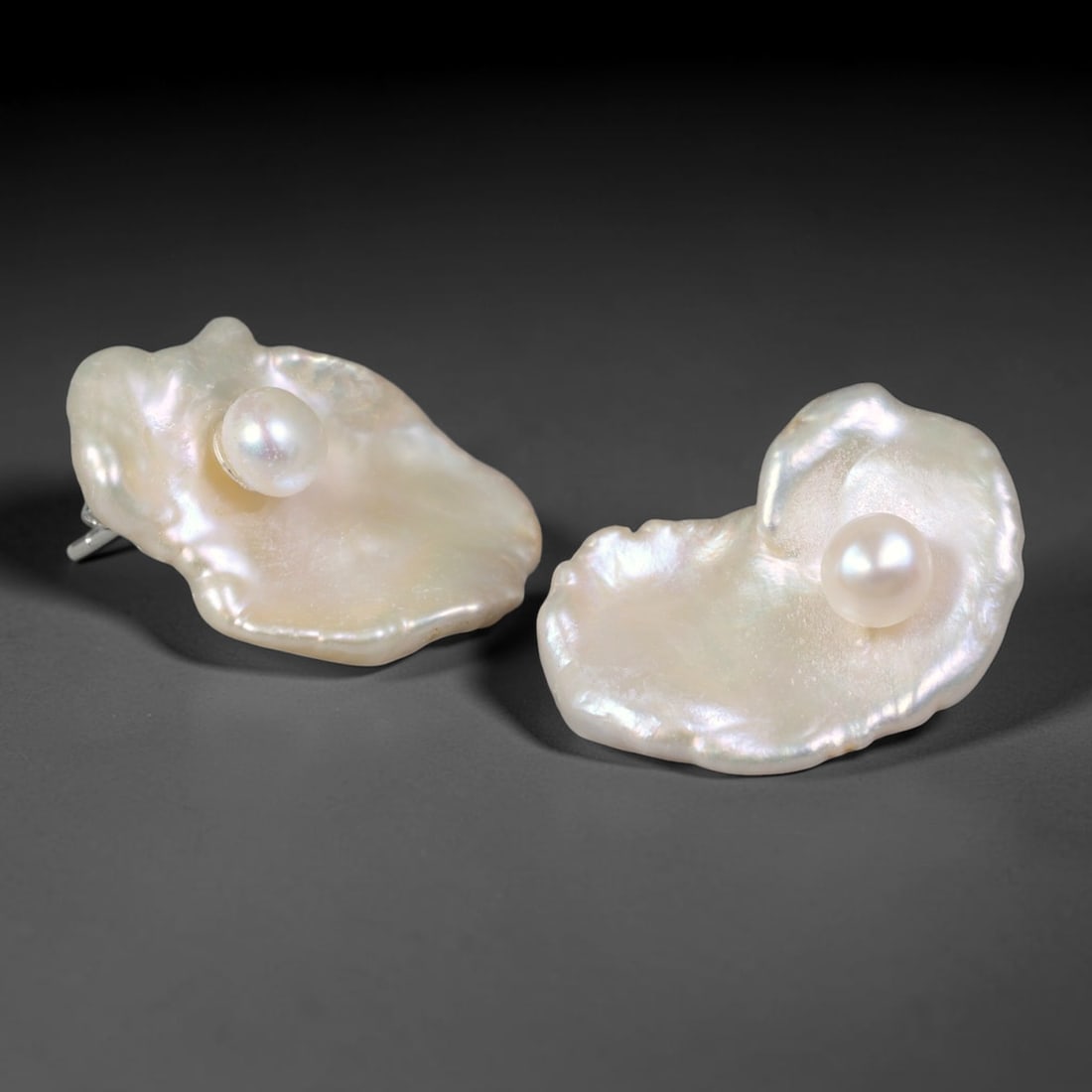 Natural Keshi Baroque Pearl Petal Stud Earrings, 51WE: Handcrafted natural freshwater pearl stud earrings featuring organic flat petal-shaped baroque keshi pearl bases with a small smooth round central pearl set at the center of each piece. The pearlescen