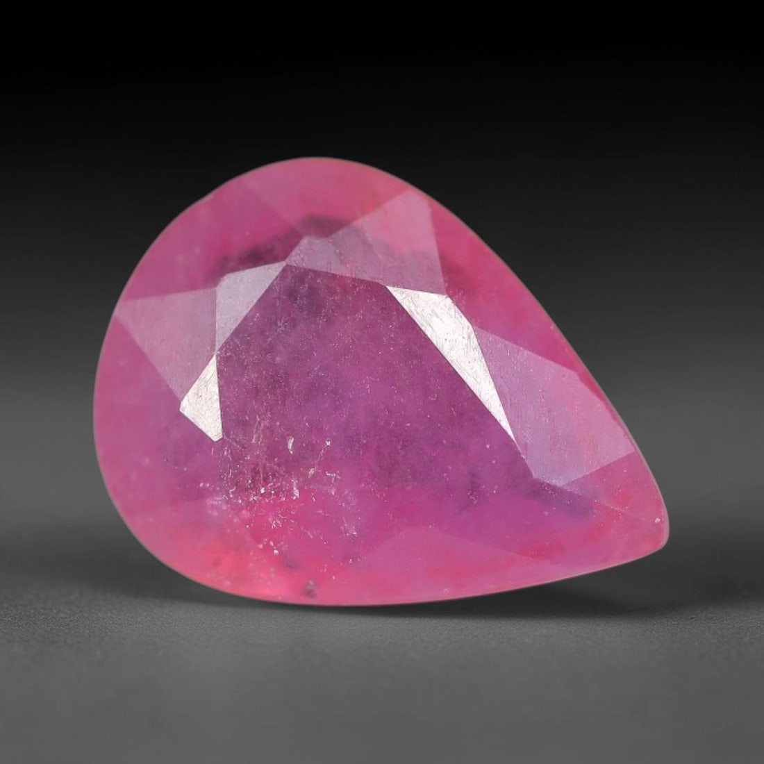 1.22 Carats Natural Orange Sapphire Pear Faceted Loose Gemstone, 93XM: This natural orange sapphire is fashioned in a classic pear brilliant faceted cut, presenting soft warm orange hues consistent with natural corundum specimens. Fine scattered mineral specks and faint 