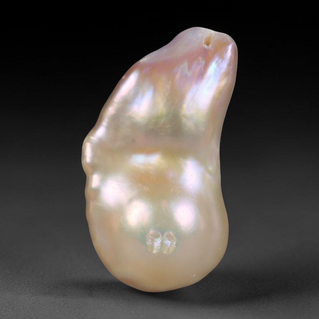 Natural Freshwater Keshi Pearl Baroque Loose Pearl, 94WE: This natural freshwater keshi pearl presents an organic irregular baroque silhouette with rich shifting iridescent nacre displaying soft champagne, peach and lavender overtones across its surface. Sub