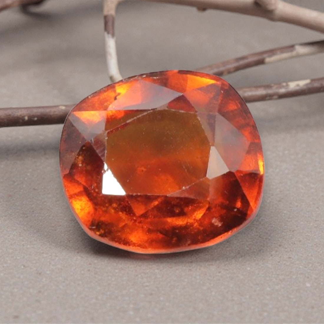3.29ct Natural Hessonite Garnet Cushion Loose Faceted Gemstone, 96YE: This natural cushion-cut hessonite garnet weighs 3.29 carats with exact dimensions of 9.0x8.3x5.0mm. It displays a rich, fiery saturated honey orange-amber tone layered with deep cinnamon brown undert