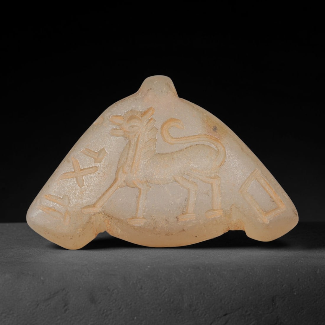Ancient Sasanian Hand Engraved Chalcedony Plaque Amulet, 43WT: Mid-sized antique wearable sacred tablet expertly carved from natural translucent chalcedony mineral, originating from ancient Sasanian Persian cultural and devotional craft traditions. Chalcedony was