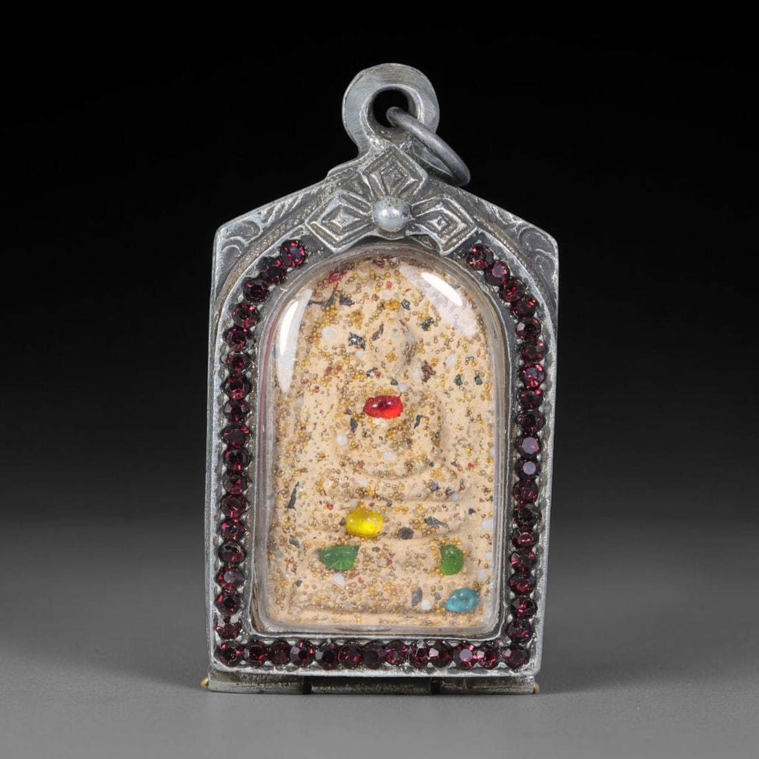 Thai Gilded Clay Metal Amulet Buddhist Votive Pendant, 35ZB: Formed from fired clay with applied gilded surface layers, the piece uses traditional molding techniques characteristic of Southeast Asian devotional craft. The construction adheres to standard region