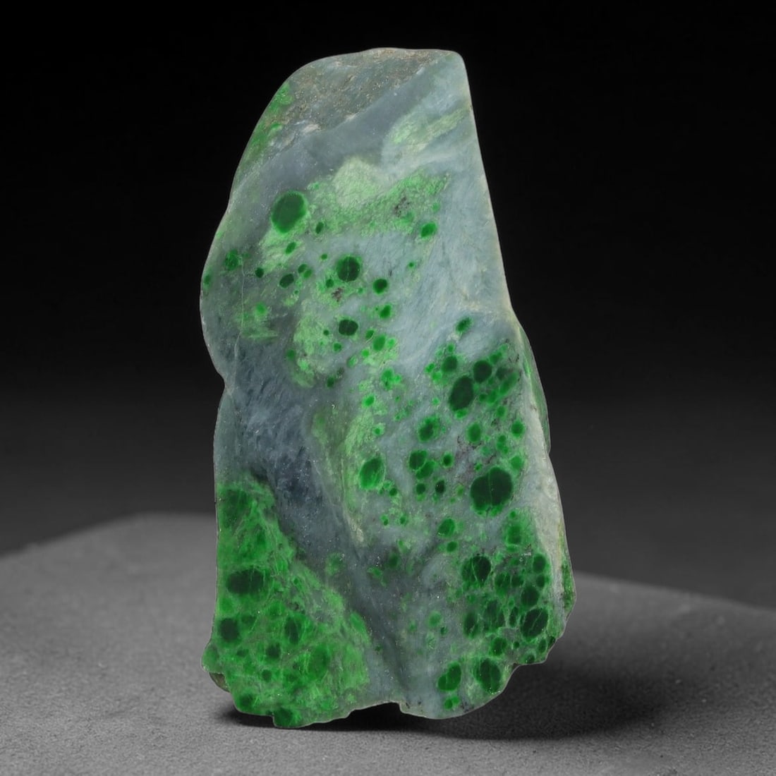 105ct Natural Type A Burmese Jadeite Jade Sliced Rough, 65YN: This specimen is a sliced rough block of natural Type A Burmese jadeite jade. The interior displays natural colour zoning with visible mineral veining and crystalline patterns typical of unprocessed j