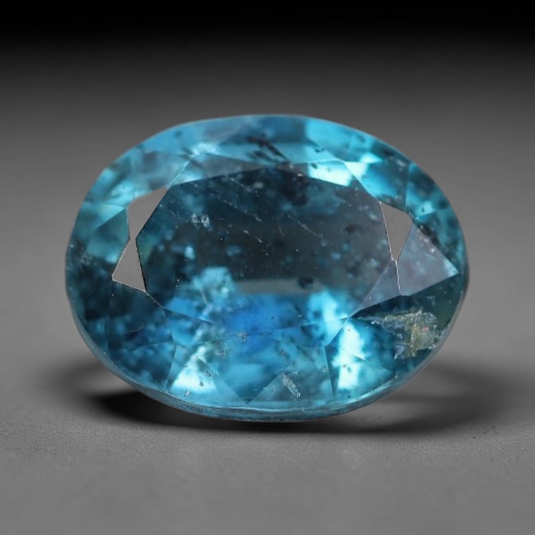 3.34 Carats Natural Deep Teal Blue Kyanite Oval Faceted Loose Gemstone, 23WS: This well-proportioned oval faceted kyanite boasts rich saturated teal-cornflower blue hue radiating through crisp polished step facets, with characteristic fine natural mineral inclusions and tiny da