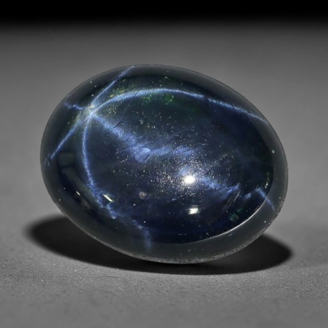 3.92 Carats Natural 6 Ray Blue Star Sapphire Loose Gemstone, 43XX: This star sapphire is crafted from natural corundum deposits and refined into a sleek polished cabochon form through professional lapidary finishing procedures. The distinct six-ray star asterism disp