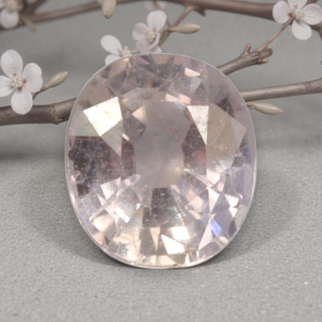 0.84 Carats Natural Pale Pink Sapphire Faceted Loose Gemstone, 80YE: This specimen is formed of natural sapphire, refined with uniform faceting to facilitate light refraction through its crystalline interior. The stone carries soft pale pink tonal saturation with mild 