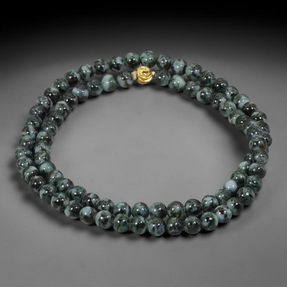 Natural Burmese Type A Ink Black Floating Jadeite Jade Beaded Necklace, 35WY: Fabricated from genuine Burmese Type A jadeite featuring natural ink black floating mineral tones distributed organically within the stone matrix, each bead receives uniform lapidary polishing for a s