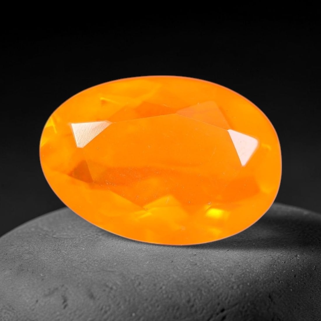 1.43 Carats Natural Ethiopian Welo Orange Fire Opal Oval Faceted Loose Gemstone, 88XX: This opal material is mined from the Welo deposits of Ethiopia and processed with professional faceted lapidary work with uniform polished facets across the gem surface. Natural subtle internal textur