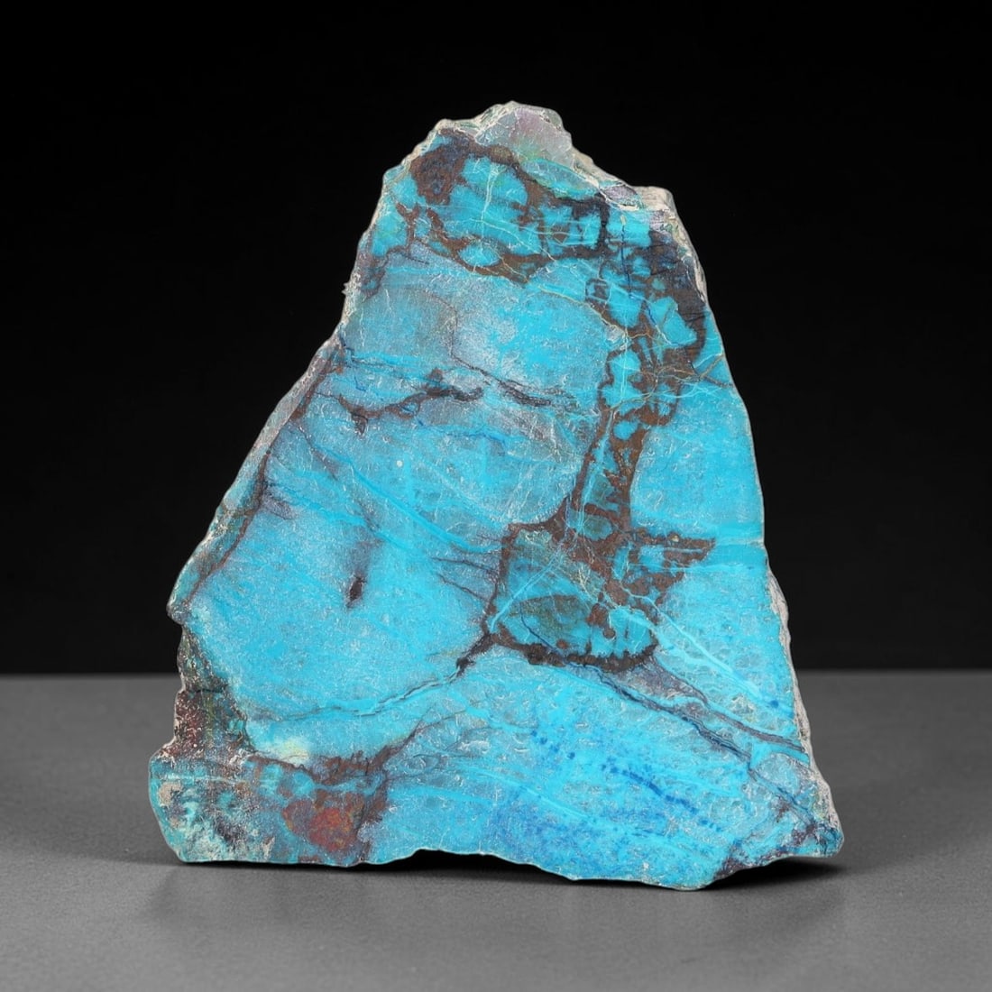 61ct Natural Peruvian Chrysocolla Polished Slab Rough, 41WV: This partial-polished chrysocolla slab features blended mineral matrix with smooth refined face and unaltered natural rugged edge across its 35x32x8mm elongated form, translucent mineral layers hold s