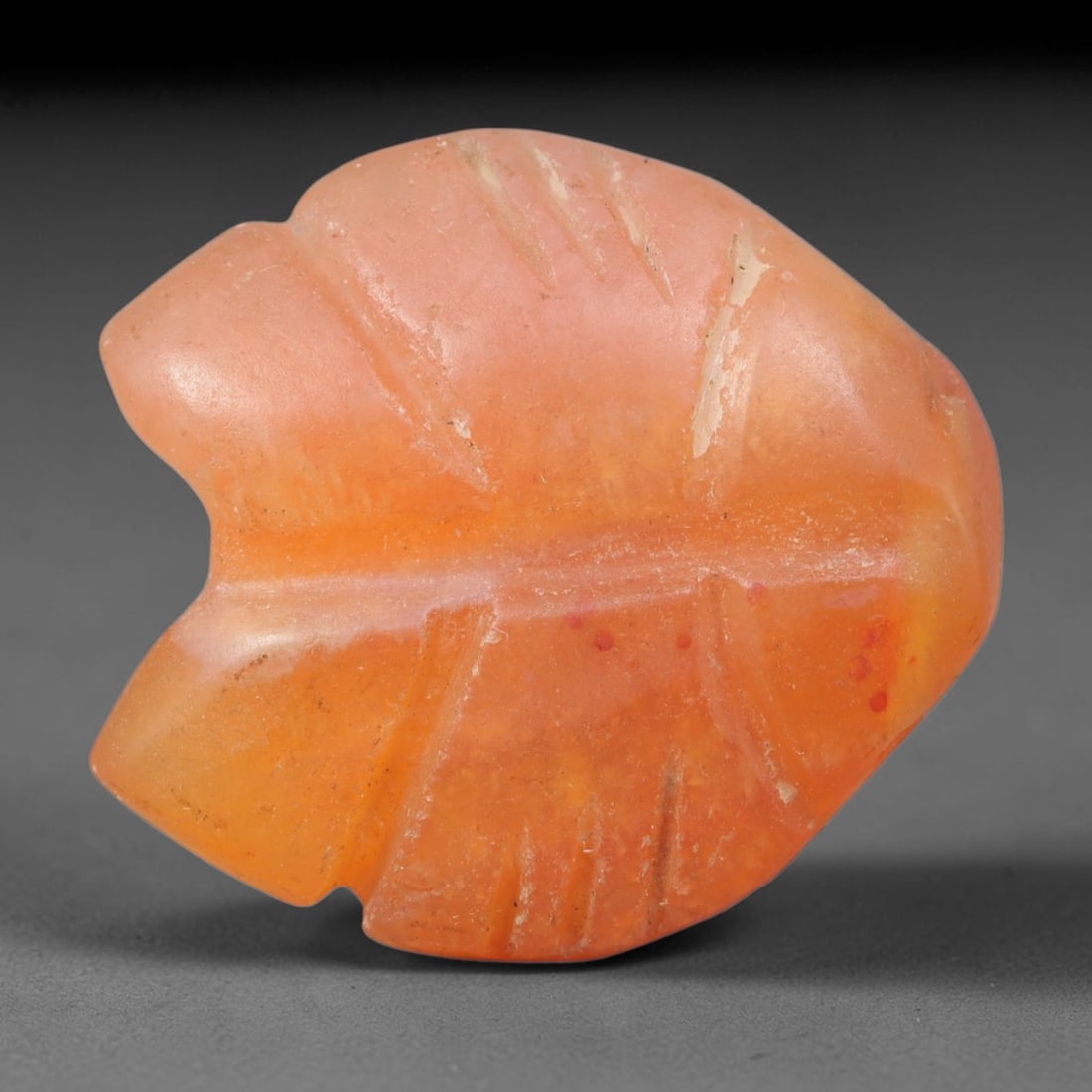 Ancient Coptic Egyptian Hand Polished Carnelian Amulet, 85XZ: Small antique wearable sacred talisman shaped from solid natural carnelian agate mineral, originating from Coptic Egyptian Nile Valley cultural and devotional traditions. Carnelian was an exceptionall