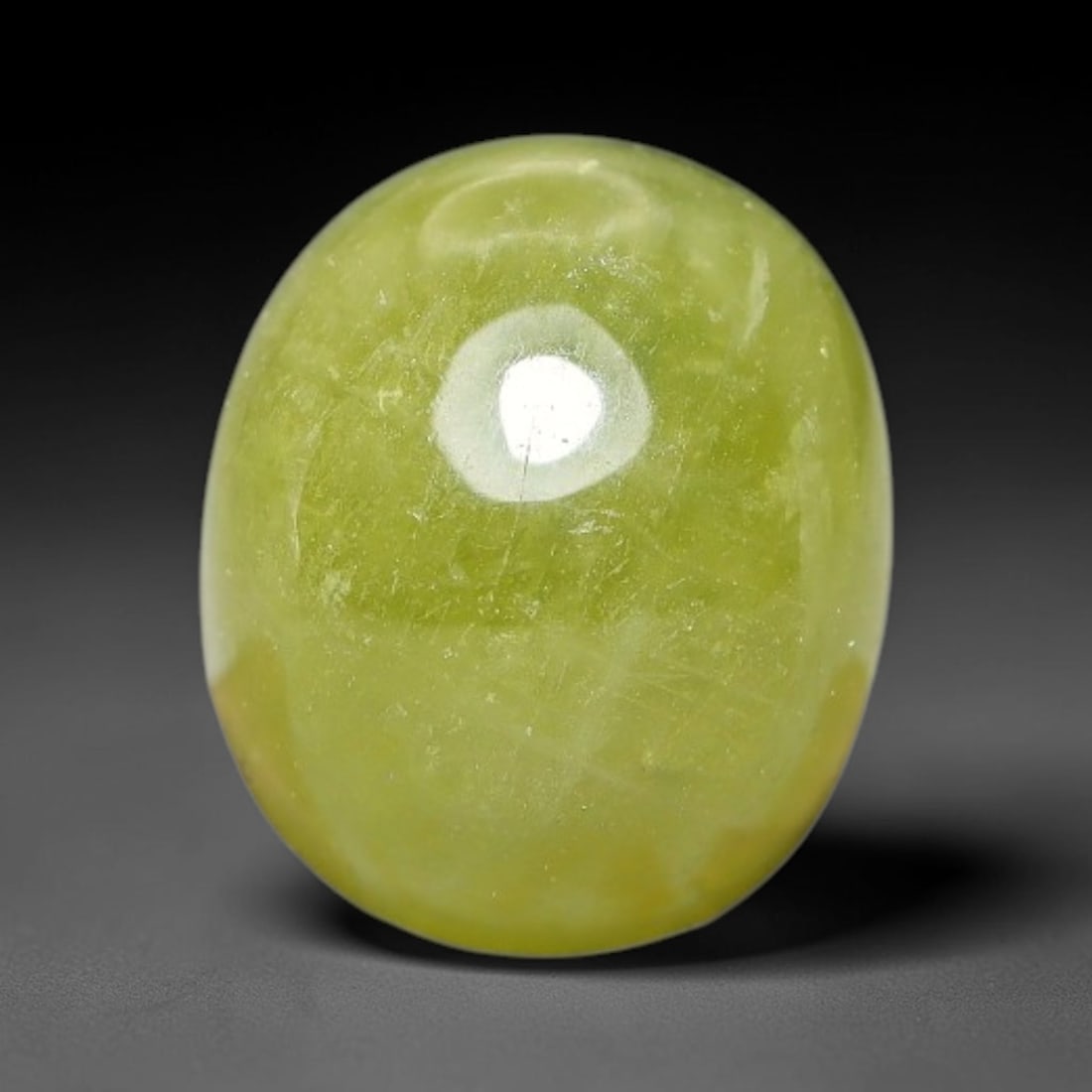 4.65 Carats Natural Madagascar Greenish Yellow Sapphire Cabochon Loose Gemstone, 32XX: Formed from natural corundum sourced from Madagascar geological deposits, this raw mineral material is processed into a polished cabochon form through professional stone finishing techniques with a sm