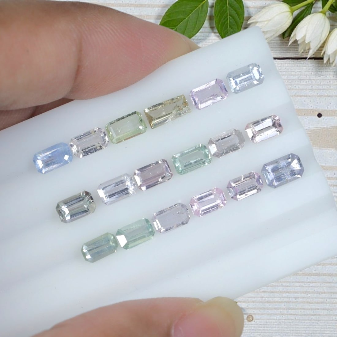 5.52 Carats Natural Pastel Multicolor Emerald Cut Sapphire Parcel - Heated Loose Gems, 18YH: This curated sapphire parcel features uniform emerald step cuts presenting a delicate pastel palette consisting of soft sky blue, pale mint green, buttery light yellow, blush pink-lavender, and clear 