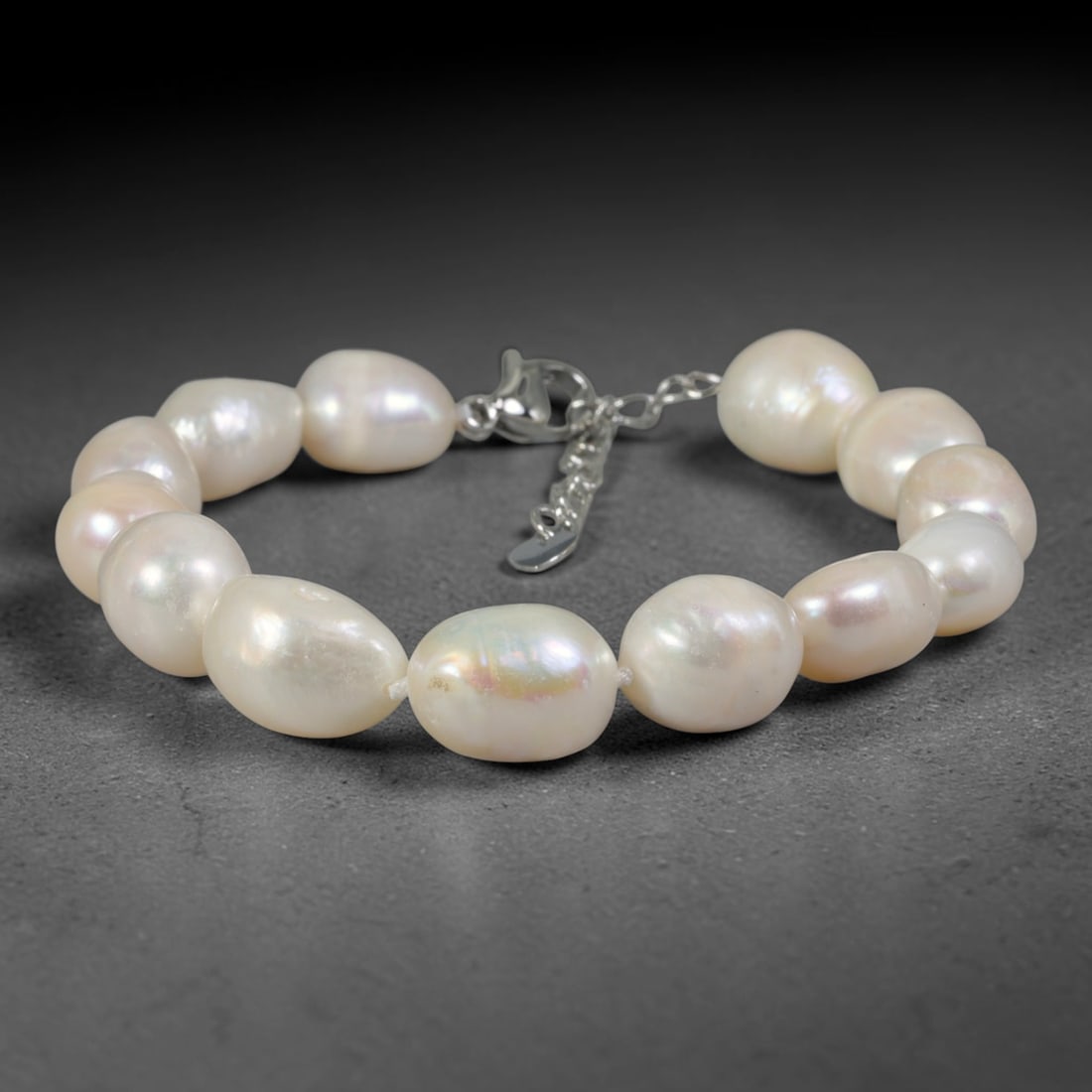 Natural Freshwater Pearl Bracelet - Baroque Luminous Pearl Strand, 87YM: Composed of large organic baroque natural freshwater pearls with bright luminous pearlescent luster, each bead showcasing substantial asymmetrical oval and teardrop contours formed through unrefined n