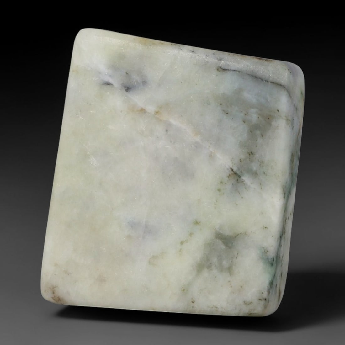 188ct Natural Type A Burmese Jadeite Jade Sliced Rough, 58YR: This specimen is a sliced rough block of natural Type A Burmese jadeite jade. The interior displays natural colour zoning with visible mineral veining and crystalline patterns typical of unprocessed j