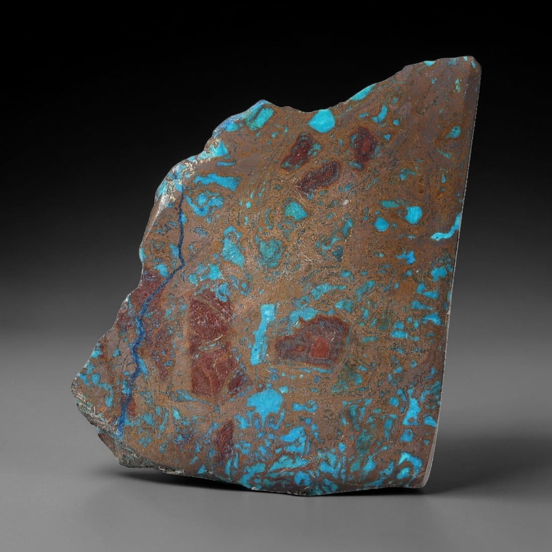53ct Natural Peruvian Chrysocolla Polished Slab Rough, 69WV: This partial-polished chrysocolla slab features blended mineral matrix with smooth refined face and unaltered natural rugged edge across its 37x29x7mm elongated form, translucent mineral layers hold s