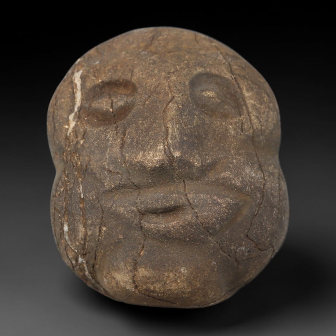 Ancient Medieval Near Eastern Tribal Hand Carved Fossil Bone Effigy Amulet, 92WT: Mid-sized antique wearable sacred effigy meticulously carved from natural fossil bone material, originating from Medieval Near Eastern tribal folk craft traditions. Fossil bone was a meaningful organi