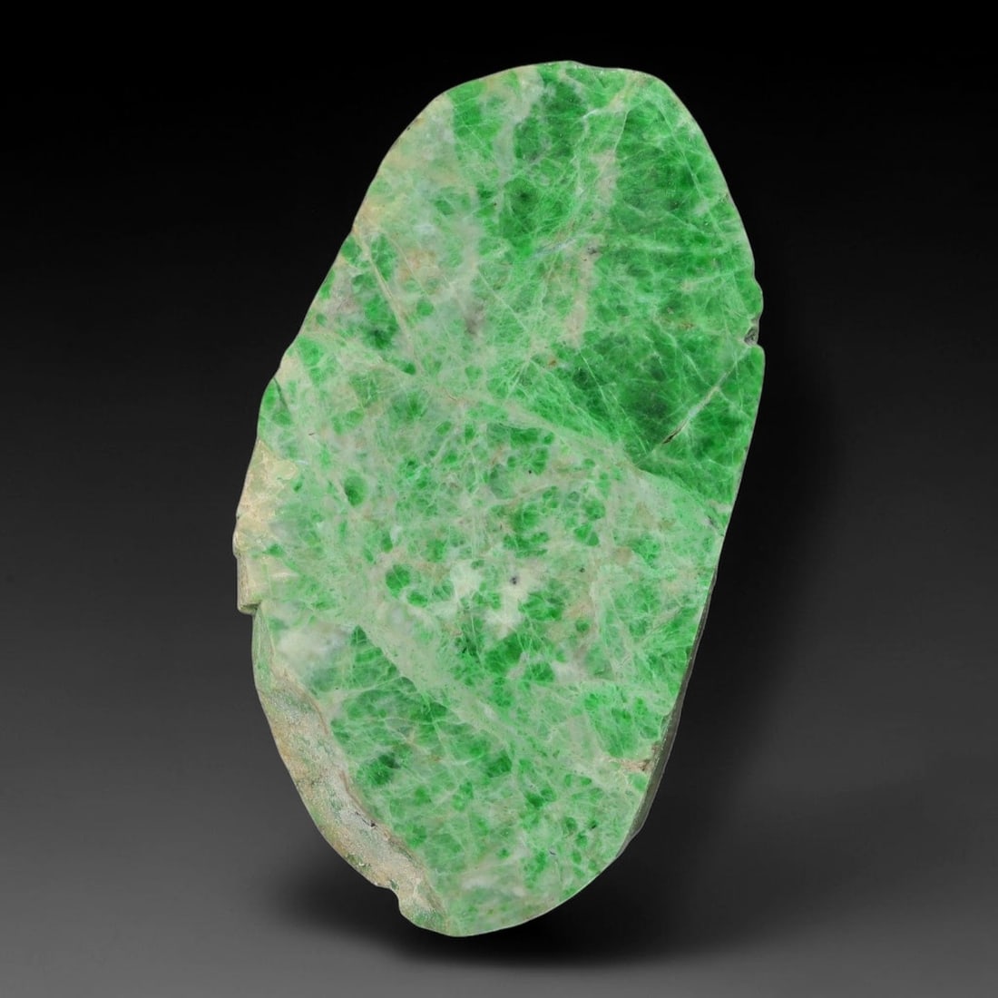 305ct Natural Type A Burmese Jadeite Jade Sliced Rough, 20YN: This specimen is a sliced rough block of natural Type A Burmese jadeite jade. The interior displays natural colour zoning with visible mineral veining and crystalline patterns typical of unprocessed j
