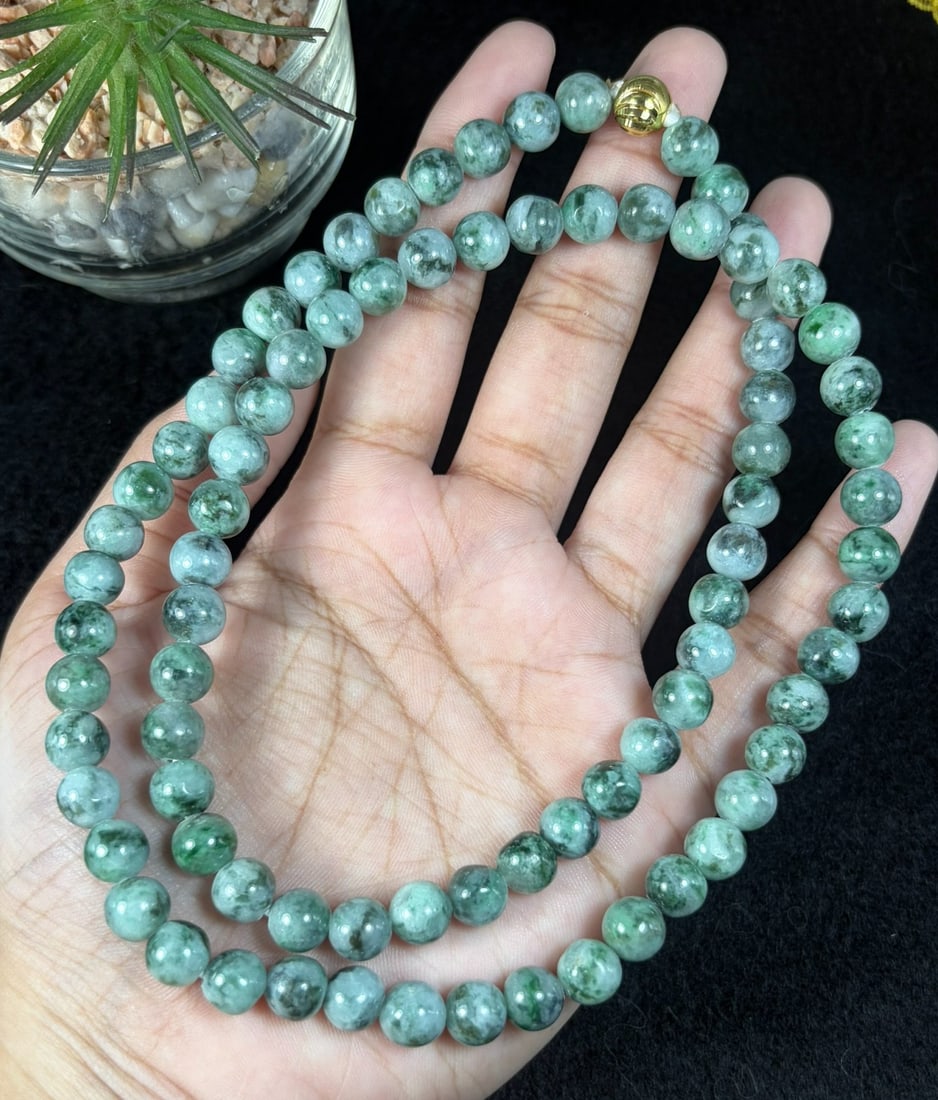 Natural Burmese Type A Grass Green Speckled Jadeite Beaded Necklace, 26YM: Hand-strung natural Burmese Type A jadeite round beads covered with fine scattered grass-green speckles across a pale translucent base, forming classic moss-in-snow texture. Every bead is evenly shape