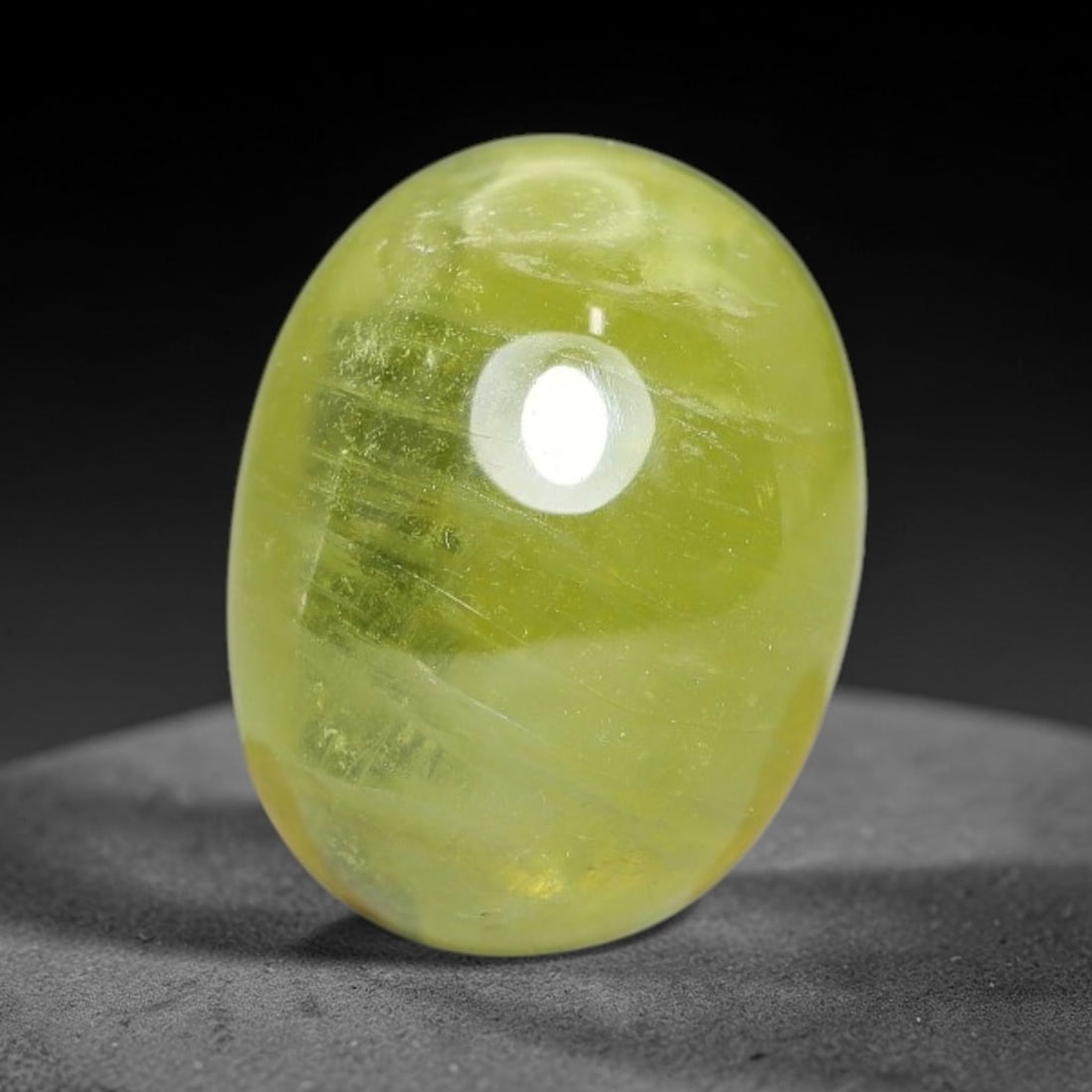 5.18 Carats Natural Madagascar Greenish Yellow Sapphire Cabochon Loose Gemstone, 39XX: Formed from natural corundum sourced from Madagascar geological deposits, this raw mineral material is processed into a polished cabochon form through professional stone finishing techniques with a sm