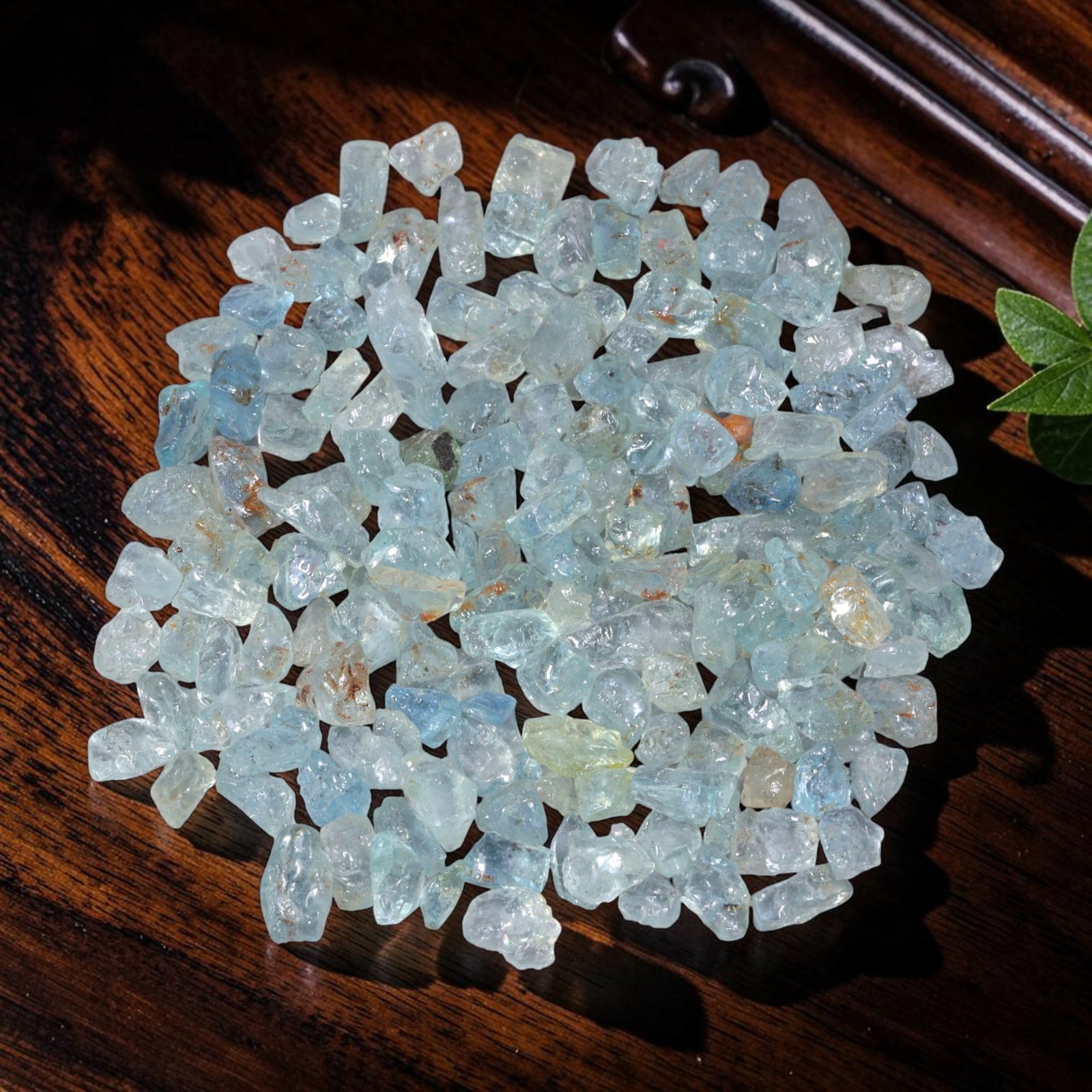 162.12 Carats Natural Aquamarine Rough Parcel, 92YH: This luminous parcel of natural aquamarine rough showcases the classic soft sky-blue hue the gem is known for, ranging from pale, translucent tones to deeper, more saturated blues. The stones are in t