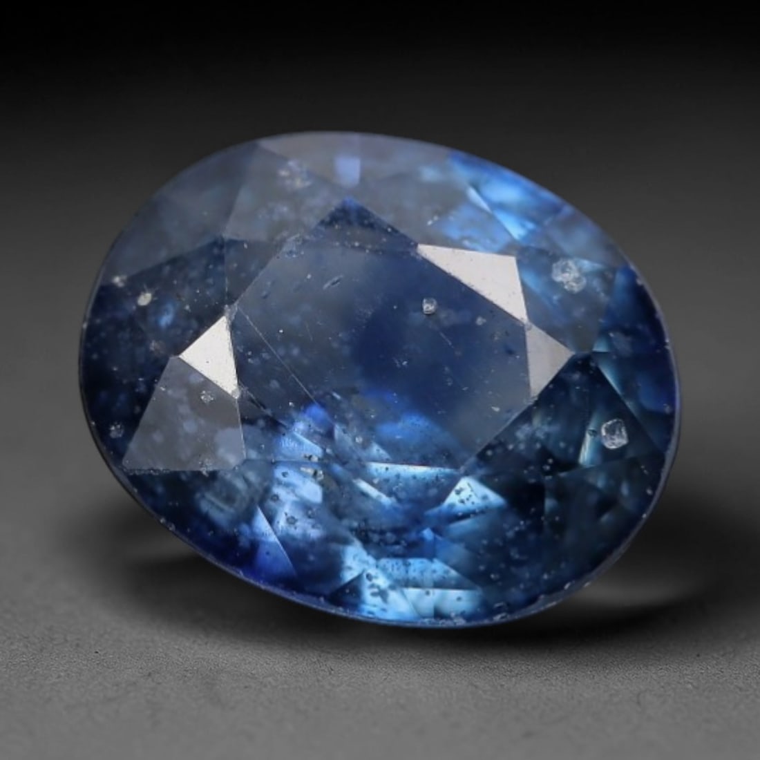 1.06ct Natural Light Cornflower Blue Oval Sapphire Loose Faceted Gemstone, LZ308: This natural oval faceted sapphire weighs 1.06 carats with exact dimensions of 6.7x5.5x3.2mm. It features a delicate light cornflower blue primary shade, accented with bright sky-blue flash zones and 