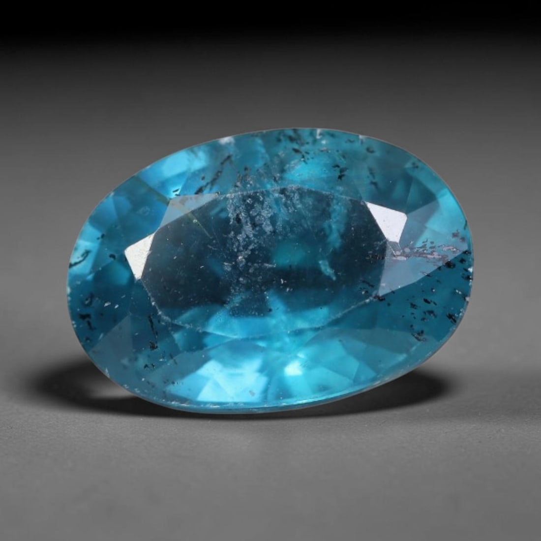 4.07 Carats Natural Deep Teal Blue Kyanite Oval Faceted Loose Gemstone, 21WS: This well-proportioned oval faceted kyanite boasts rich saturated teal-cornflower blue hue radiating through crisp polished step facets, with characteristic fine natural mineral inclusions and tiny da