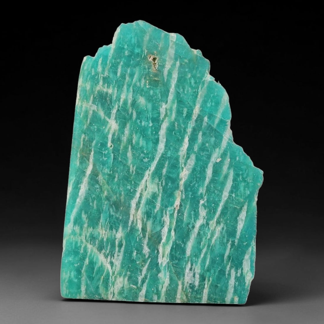 64ct Natural Russian Ural Amazonite Slab Rough, 13WV: This intact amazonite slab features distinct parallel mineral banding running uniformly across its naturally split flat surface within 41x28x5mm slab dimensions, retaining unmodified natural geologica