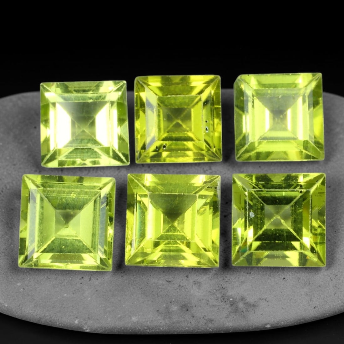 7.30ct Natural Peridot Square Faceted Parcel Loose Gemstone, 99XX: Matching parcel of hand faceted natural peridot gemstones featuring vibrant consistent lime-green body tone with subtle natural internal mineral characteristics visible throughout each stone. Every ge