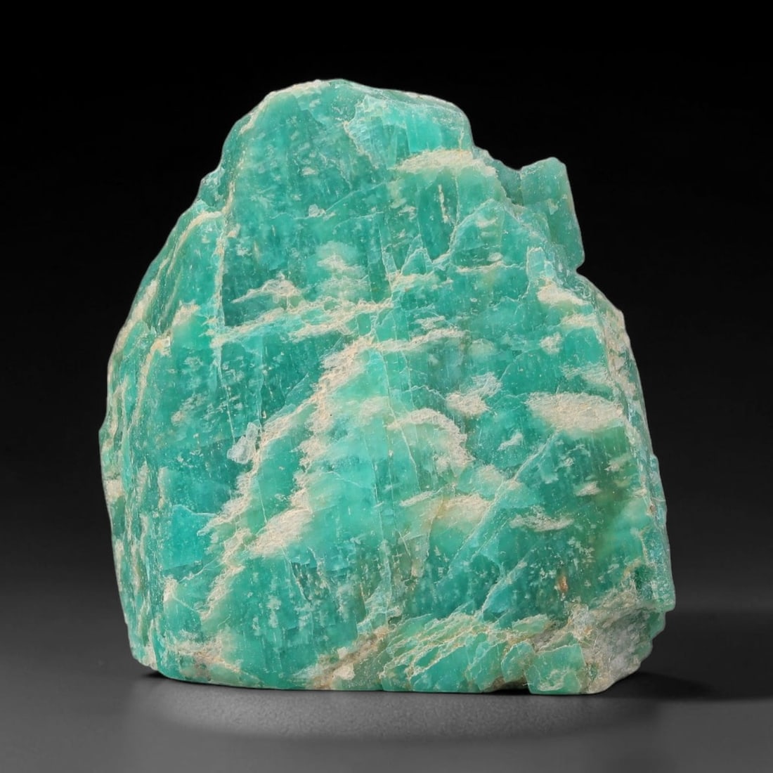 79ct Natural Russian Ural Amazonite Slab Rough, 40WV: This intact amazonite slab features distinct parallel mineral banding running uniformly across its naturally split flat surface within 35x32x13mm slab dimensions, retaining unmodified natural geologic