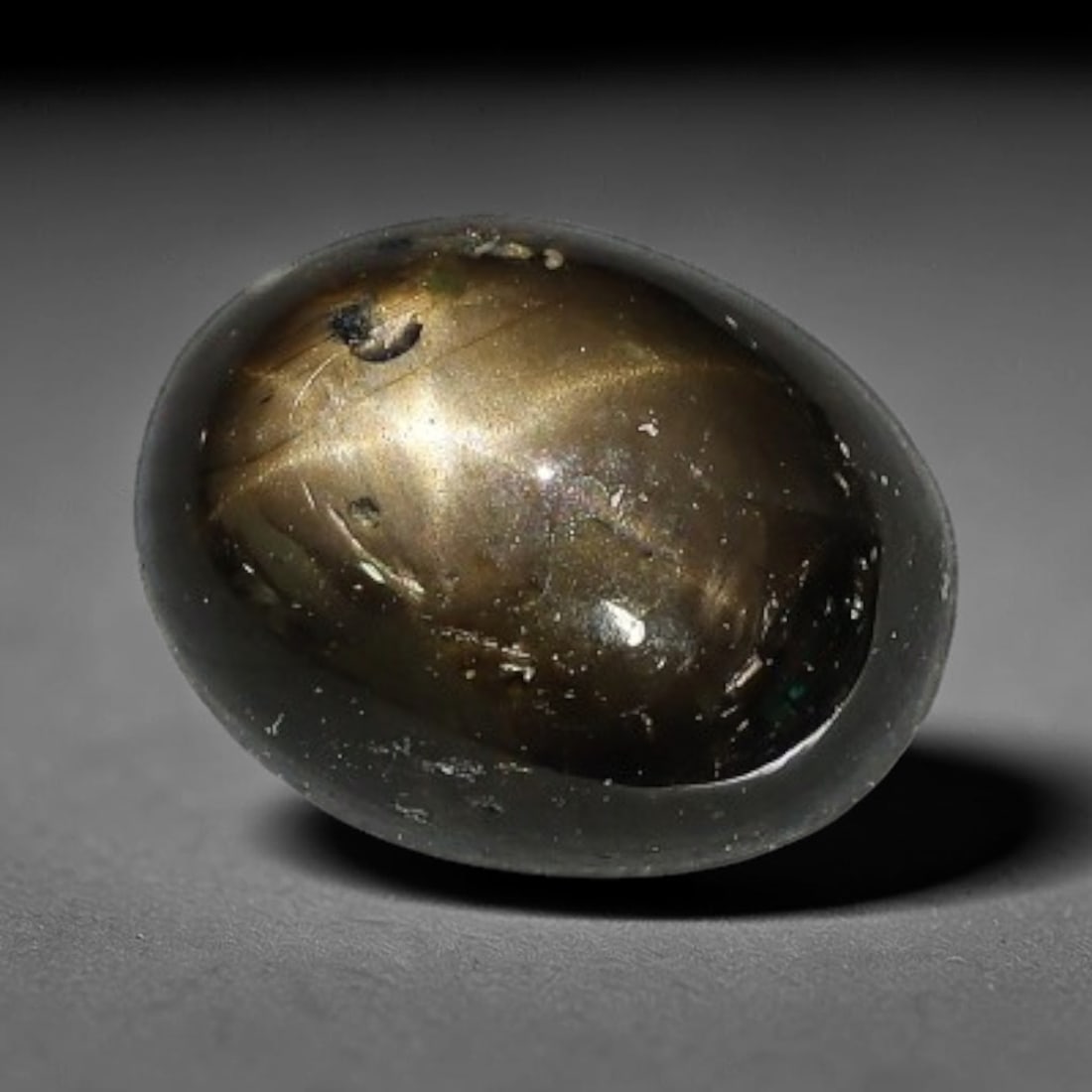 2.42ct Natural Siamese 6-Ray Black Star Sapphire Loose Gemstone, 60WW: This polished star sapphire originates from classic Siamese mining deposits, featuring a deep dark crystalline base with fine native mineral traces trapped within its structure, sized at calibrated 8x