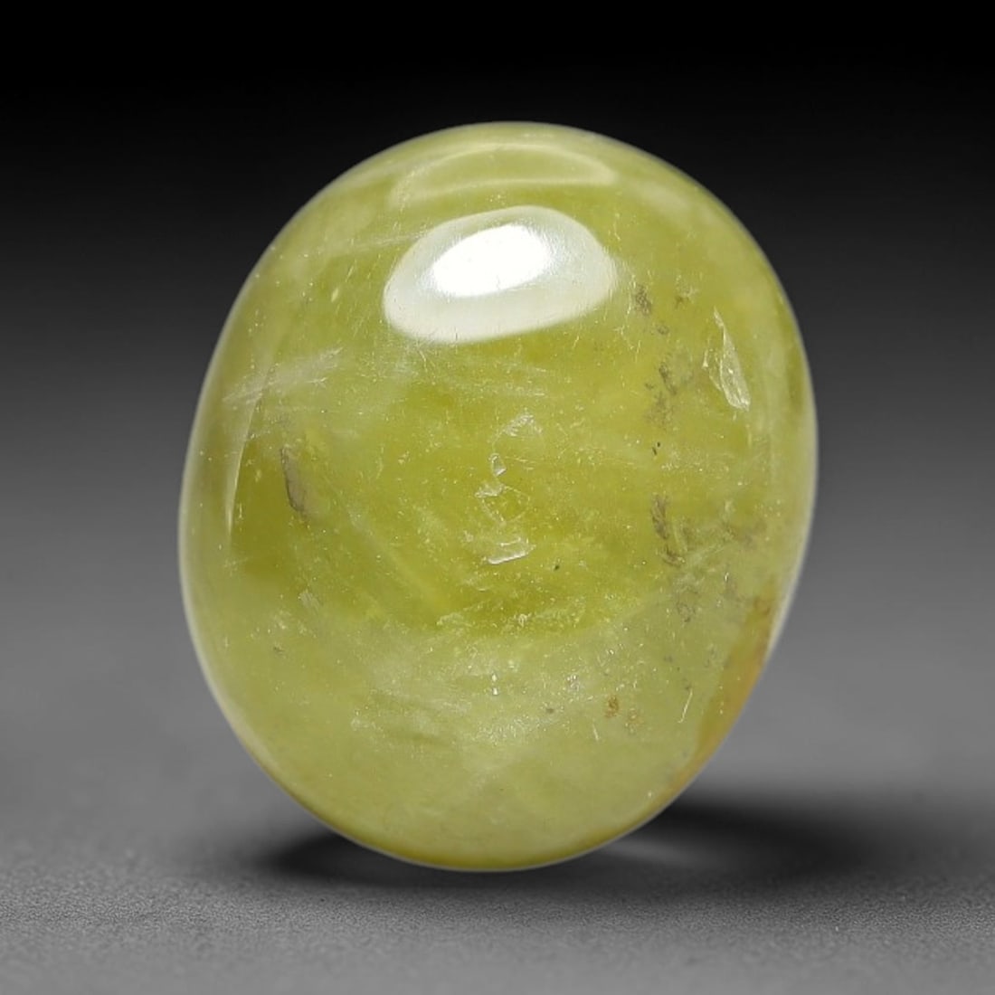 5.22 Carats Natural Madagascar Greenish Yellow Sapphire Cabochon Loose Gemstone, 36XX: Formed from natural corundum sourced from Madagascar geological deposits, this raw mineral material is processed into a polished cabochon form through professional stone finishing techniques with a sm