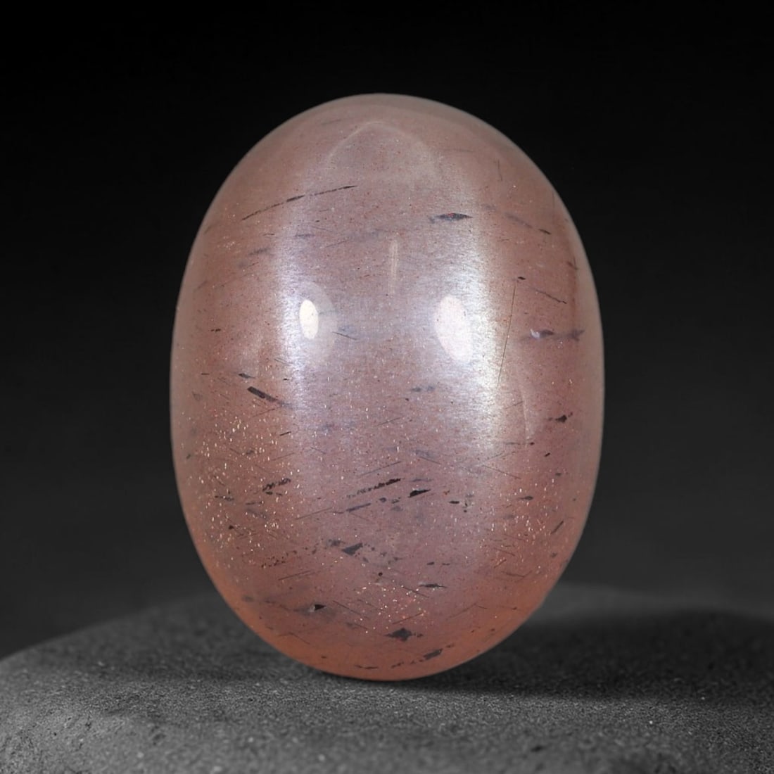 9.35 Carats Natural Ceylon Peach Moonstone Loose Gemstone, 50WJ: This natural Ceylon moonstone carries dimension measurements of 16.2x11.9x6.7mm, a premium feldspar mineral sourced from Ceylon's historic moonstone mining grounds celebrated for stones displaying cha