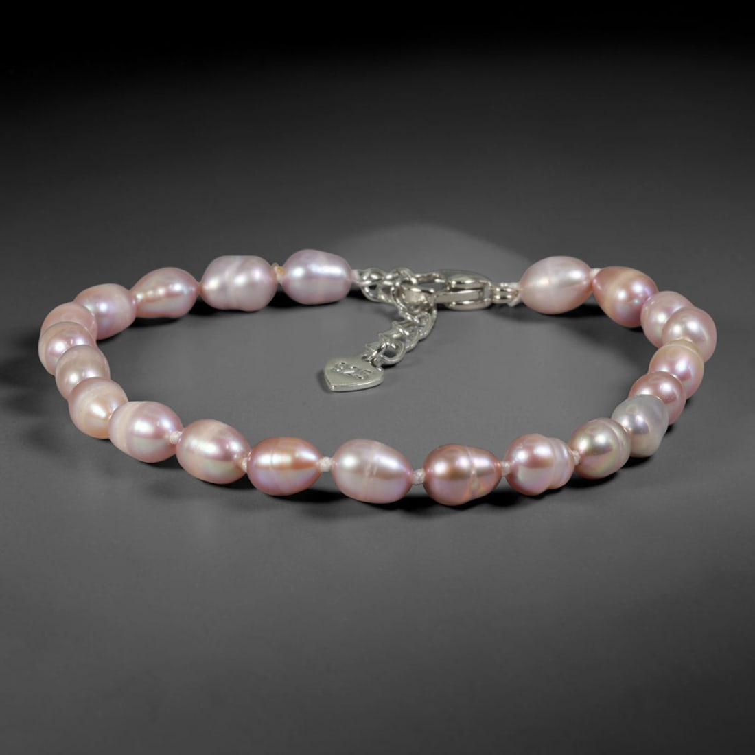 Natural Freshwater Pearl Bracelet - Baroque Lavender Blush Pearl Strand, 67YM: Strung from petite organic baroque natural freshwater pearls with soft lavender blush pearlescent iridescence, each bead displaying delicate asymmetrical oval and teardrop shapes formed through natura
