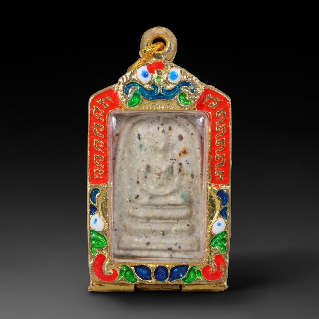 Thai Gilded Clay Metal Amulet Buddhist Votive Pendant, 48ZB: Constructed from fired clay with light gilded finishing layers, the piece uses traditional molded crafting techniques typical of Southeast Asian devotional artifacts. Its rectangular form follows stan