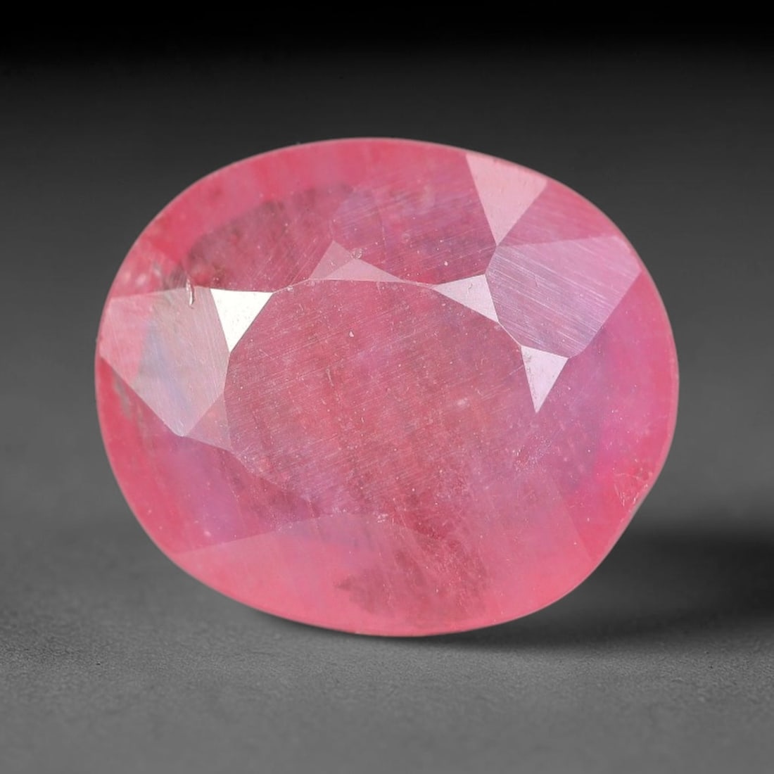 Certified 2.22 Carats Orange Pink Natural Ceylon Sapphire Single Oval Faceted Cut Gemstone, LZ851: This single oval faceted natural sapphire boasts striking blended orange pink color with consistent tone saturation across its 9.30 mm x 7.91 mm x 2.95 mm measurements, symmetrical oval faceting deliv
