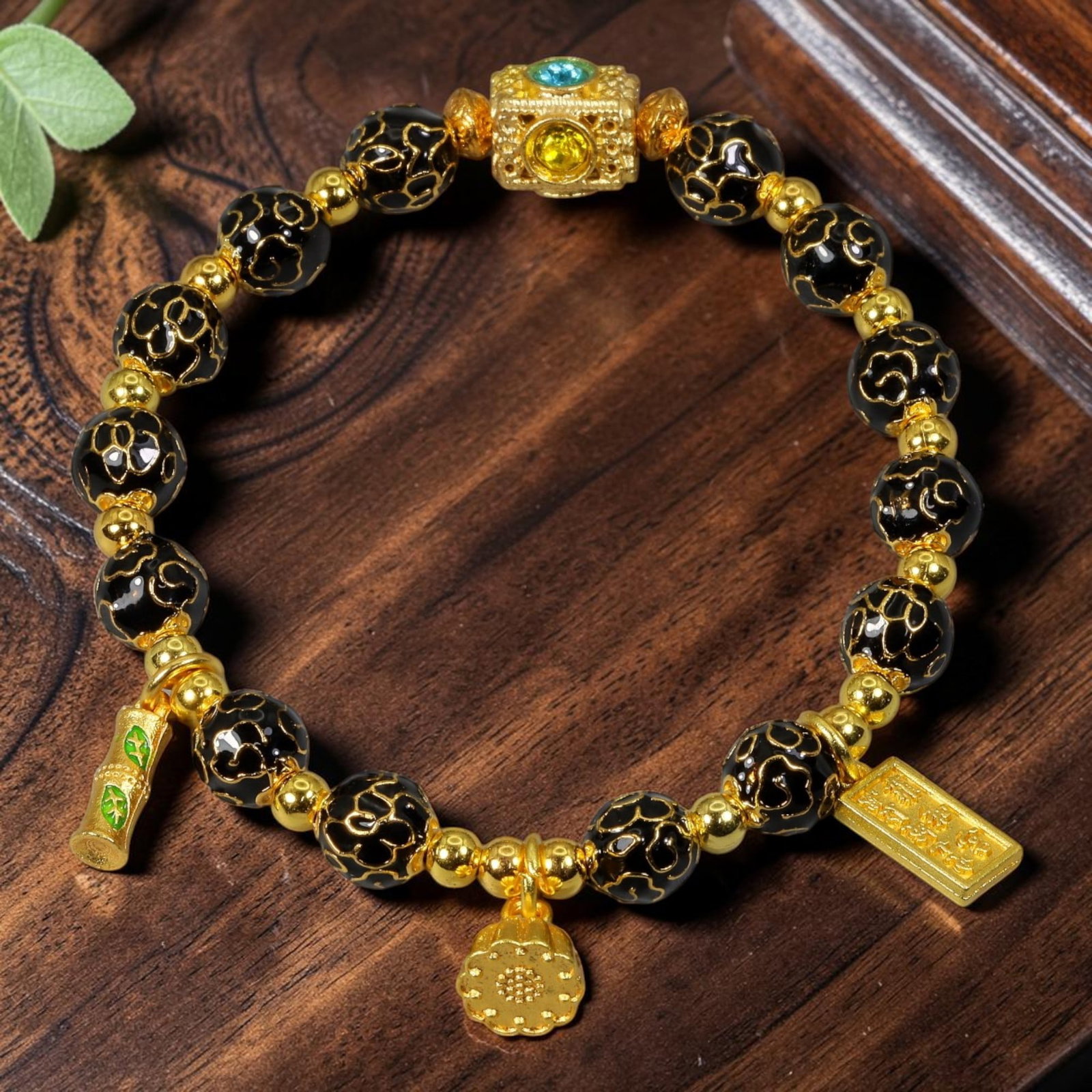 Chinese Cloisonne Enamel Beaded Bracelet - Black Gold Multi Auspicious Charm Set, 67YG: This modern Chinese revival stretch bracelet features round cloisonne enamel beads measuring 7.80 millimeters, crafted with glossy black enamel decorated with raised gold-tone swirling cloud scroll wi