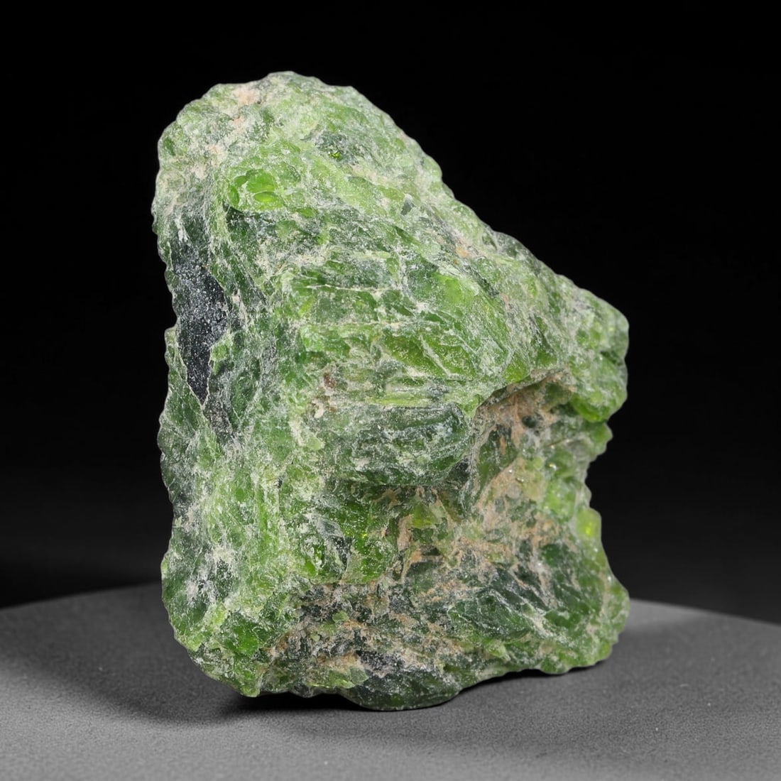 79 Carats Natural Vibrant Green Chrome Diopside Rough Specimen, 31YS: This is an untreated natural chrome diopside mineral specimen formed through natural geological processes, displaying rich green coloration caused by chromium content within its crystalline structure.