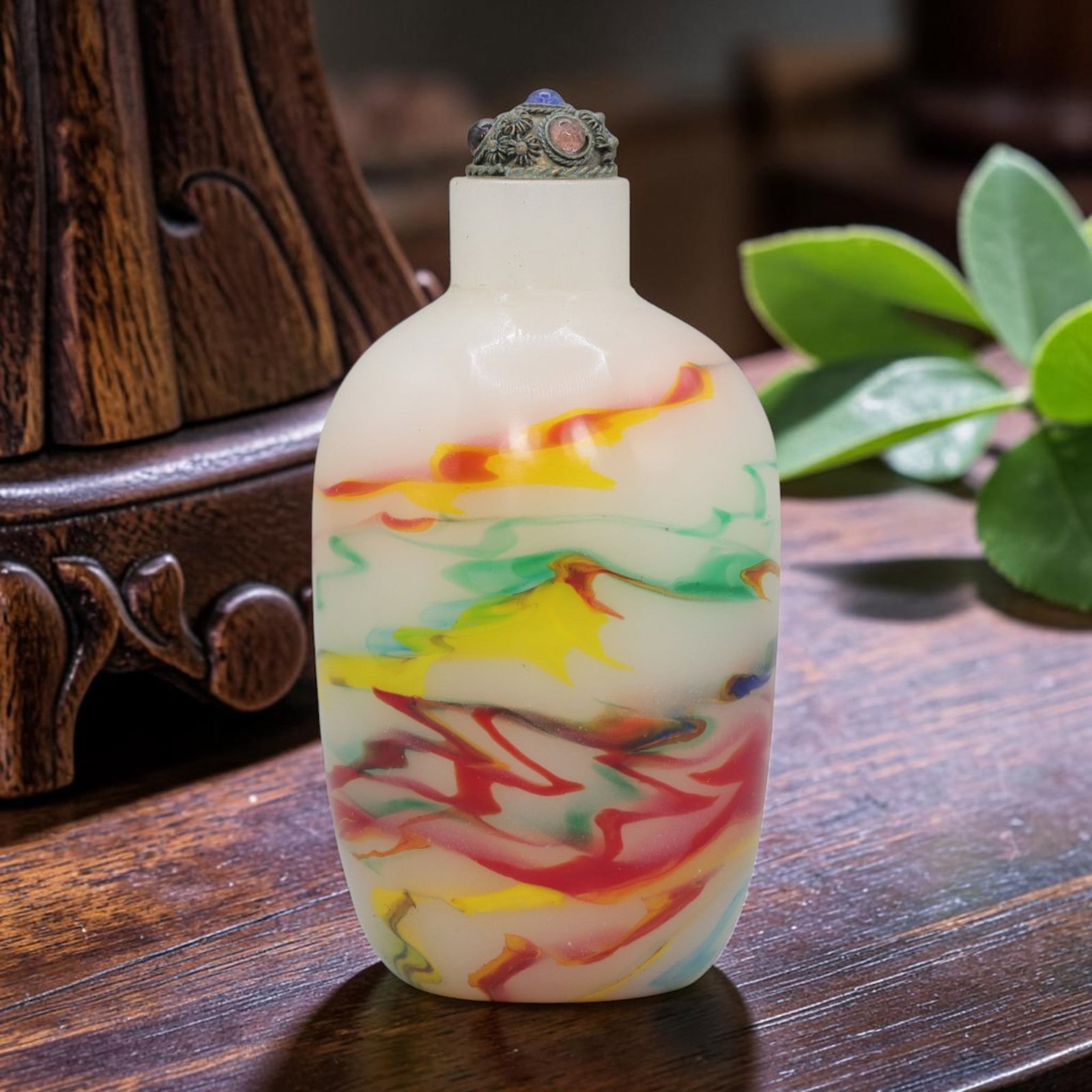 Vintage Chinese Multicolored Swirl Liuli Glass Snuff Bottle, 68YF: Crafted from translucent white glass with vibrant multicolored swirls, this vintage Chinese snuff bottle features a striking marbled pattern of red, yellow, green, and blue hues flowing across the bod
