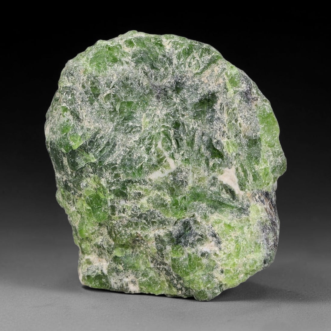 101 Carats Natural Vibrant Green Chrome Diopside Rough Specimen, 24YS: This is an untreated natural chrome diopside mineral specimen formed through natural geological processes, displaying rich green coloration caused by chromium content within its crystalline structure.