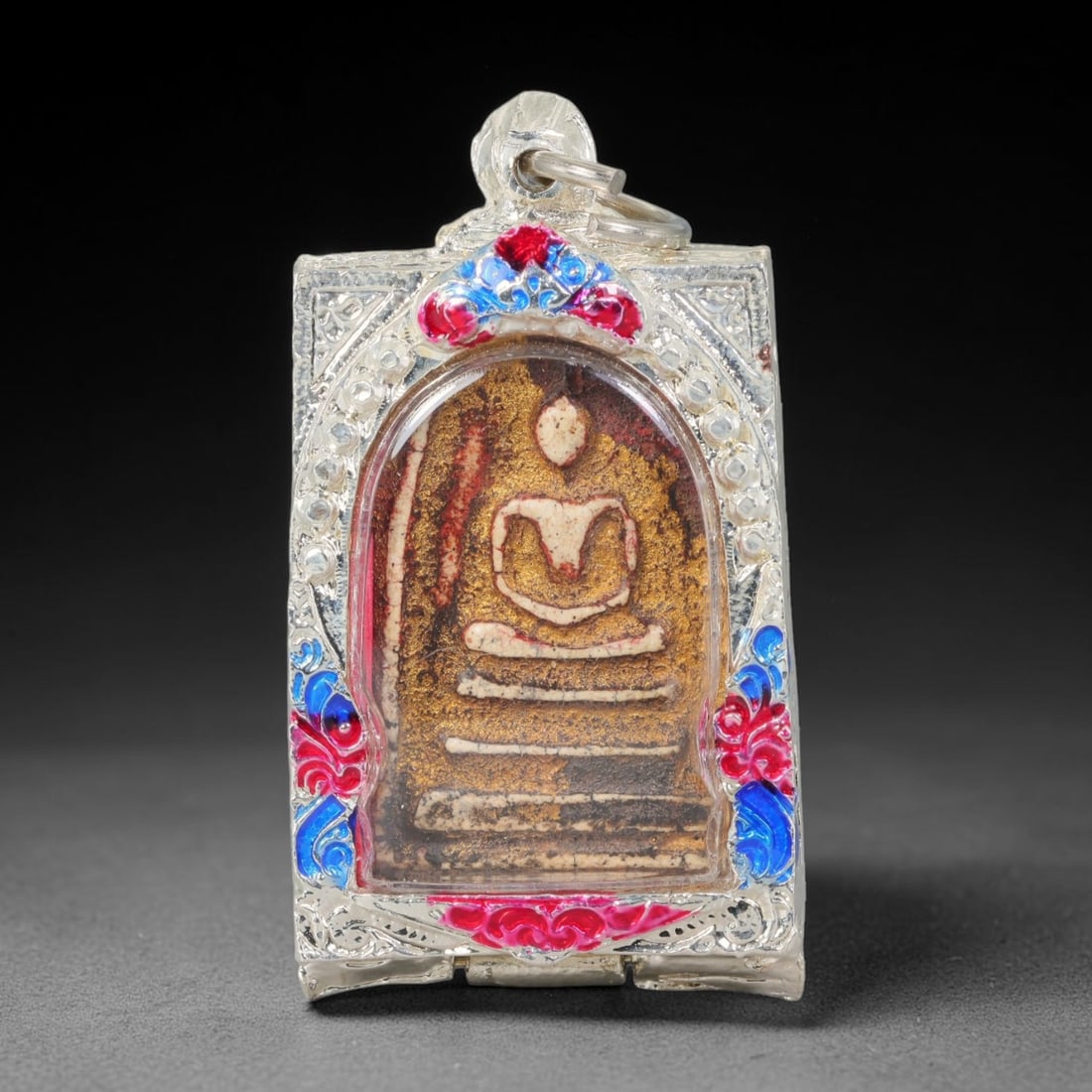 Thai Gilded Clay Metal Amulet Buddhist Votive Pendant, 31ZB: Formed from fired clay with subtle gilded finishing, the artifact uses traditional molded crafting techniques widely seen in Southeast Asian devotional craftwork. Its rectangular shape conforms to sta