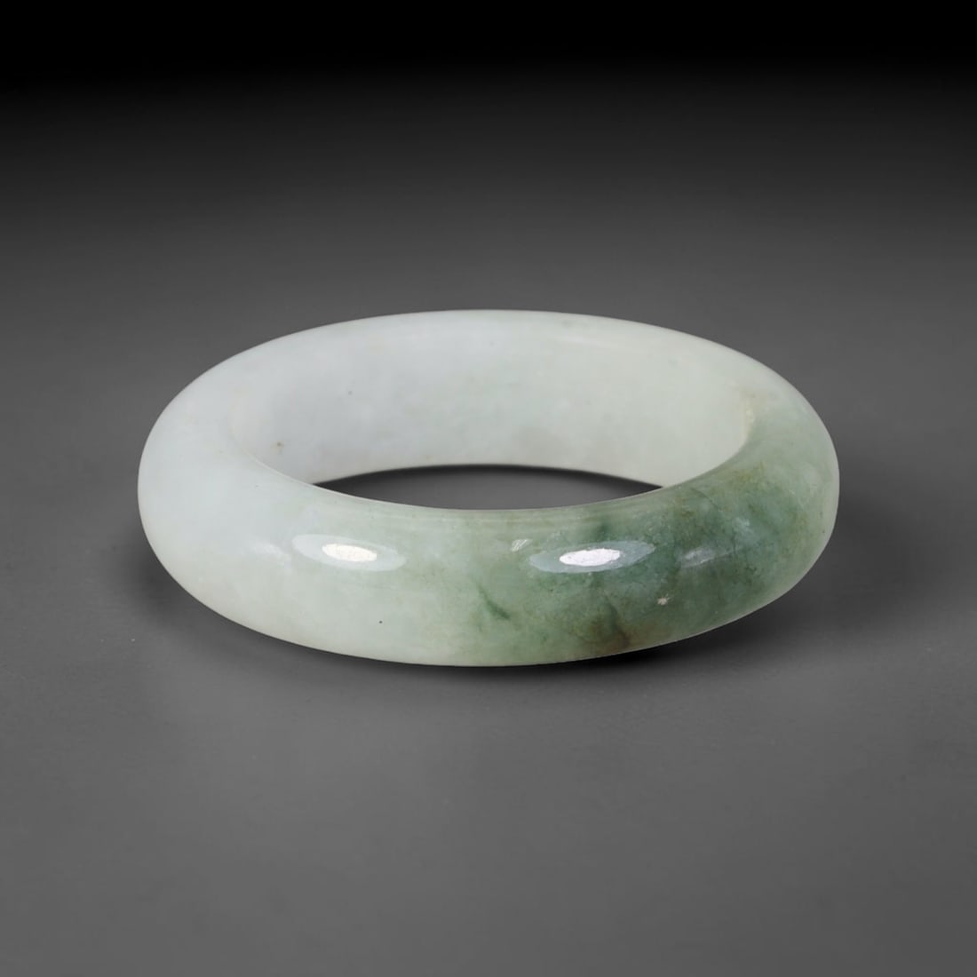 Natural Burmese Type A Jadeite Jade Band Ring Size US 12, 53TB: Crafted from untreated natural Burmese Type A jadeite jade, this solid stone band features a high-gloss polished finish displaying consistent deep green mineral tones interwoven with natural subtle to