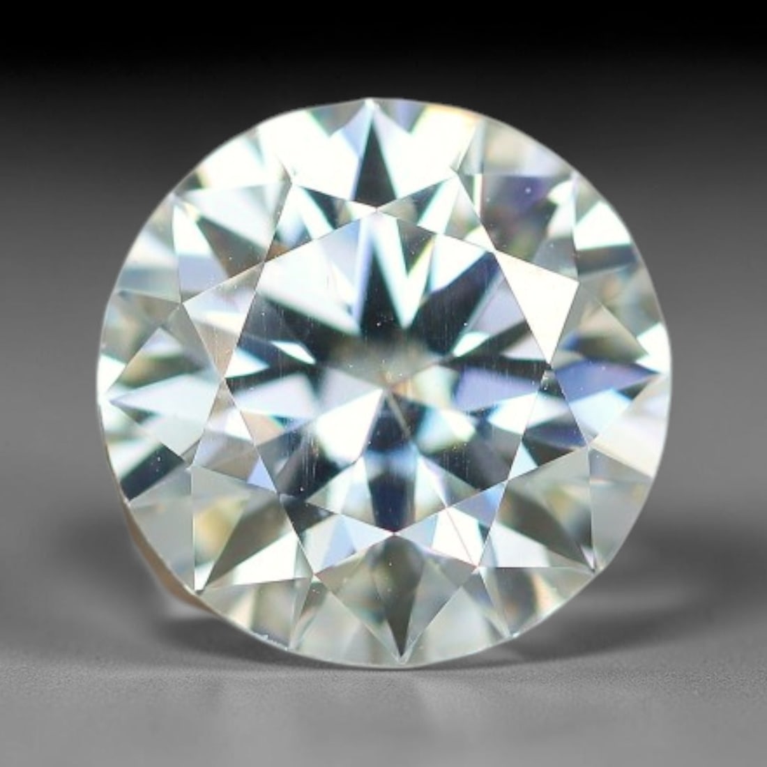 1.13 Carats Clear Moissanite Loose Gemstone, 50WP: This moissanite features dimensions of 6x4.1mm, a lab-created silicon carbide gemstone prized for its exceptional refractive index that generates brilliant light dispersion and consistent sparkle in a