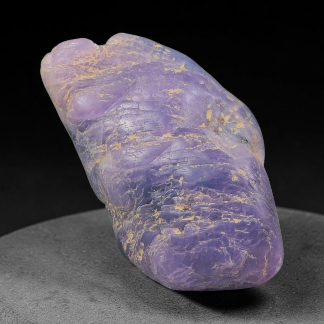53ct Natural Unheated Sri Lankan Purplish Blue Sapphire Rough, 29YQ: This natural corundum rough is an unheated purplish blue sapphire sourced from Sri Lankan alluvial gem deposits, featuring an irregular natural native form with residual pale yellow-brown mineral matr