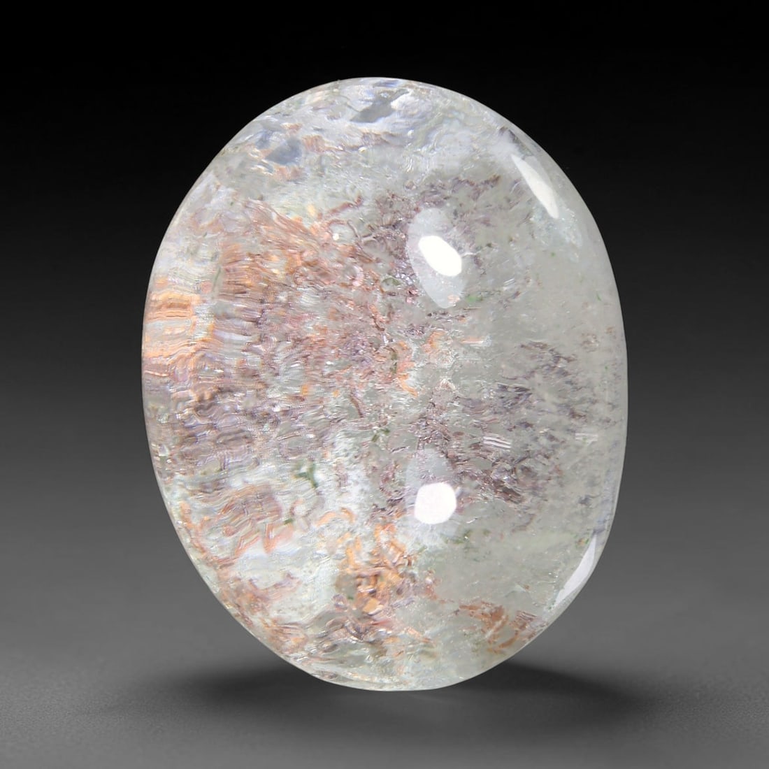24.82ct Natural Brazilian Phantom Quartz Oval Cabochon Loose Gemstone, 63YX: This smoothly polished cabochon of natural phantom quartz preserves delicate layered phantom crystal formations enclosed inside transparent quartz host. The domed polished surface offers unobstructed 