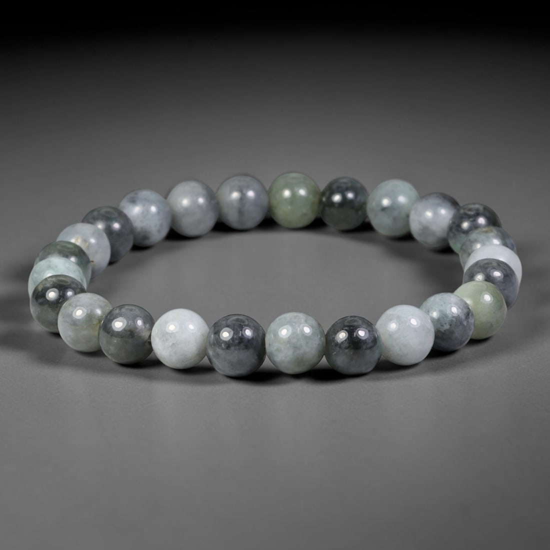 Natural Burmese Type A Grey Ink Jadeite Jade Beaded Bracelet, 77TA: Handmade from 100% untreated authentic Burmese Type A jadeite, this bracelet features evenly polished smooth round beads with a milky white base naturally permeated by smoky grey ink speckles and fain