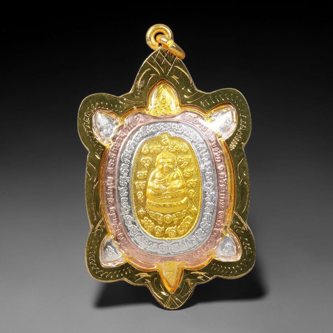Thai Tri-Metal Turtle Buddha Amulet - Gold Cased Pendant, 12YY: Distinct turtle-shaped devotional pendant crafted with three tone metal finishes of gold, rose copper and silver, enclosed in polished engraved gold casing with clear protective cover and integrated h